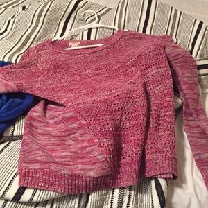 A pink see through long sleeve